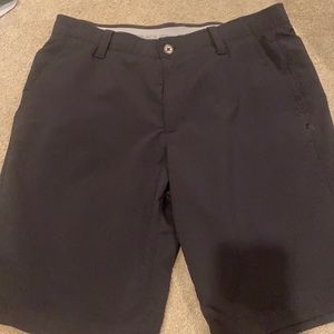 Black under armour golf shorts.